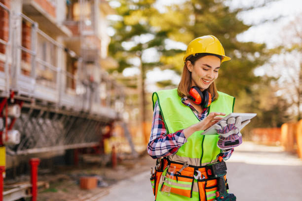 istock Blue-collar woman working on the construction site 1140219127
