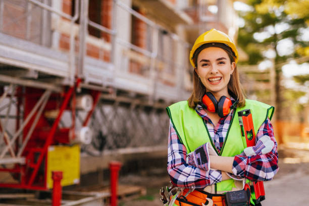 istock Blue-collar woman working on the construction site 1140219131
