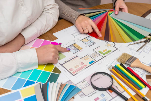 istock Teamwork of creative designers working with colour palette 1140219314