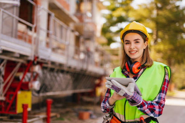 istock Blue-collar woman working on the construction site 1140219397