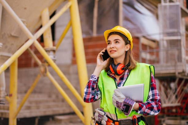 istock Blue-collar woman working on the construction site 1140220092