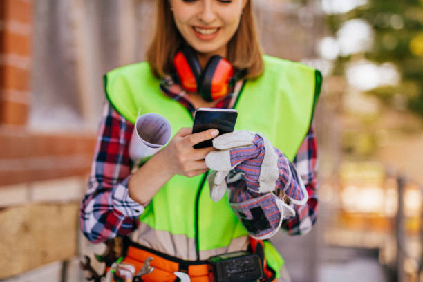 istock Blue-collar woman working on the construction site 1140222689