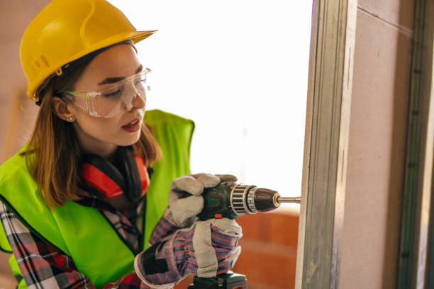 istock Blue-collar woman working on the construction site 1140222817