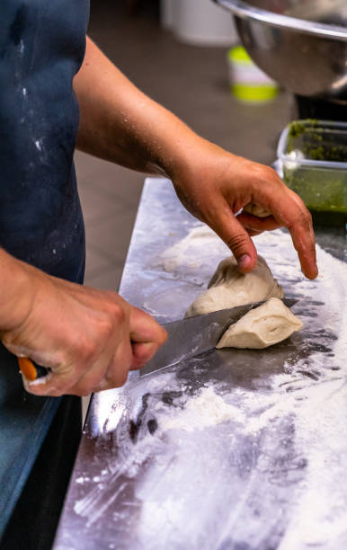istock Female Chef Preparing Bread Dough for Selfmade Bread and Patties 1140222918