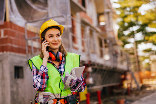 istock Blue-collar woman working on the construction site 1140222991