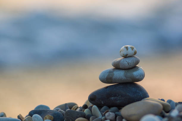 istock stack of zen stones on pebble beach 1140223695