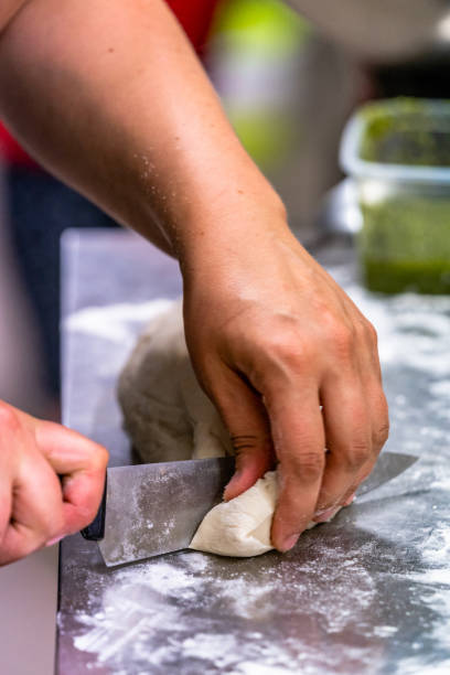 istock Female Chef Preparing Bread Dough for Selfmade Bread and Patties - Kitchen Set with Isolated Action, Only Chef`s Hands 1140223701