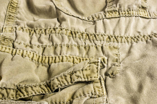 istock clothing items washed cotton fabric texture with seams 1140225616