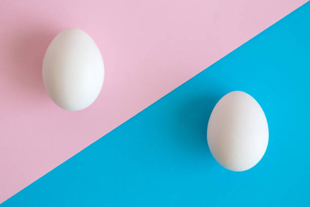 istock White Easter eggs on pastel background. Happy Easter minimal concept. Flat lay. Top view. 1140226282