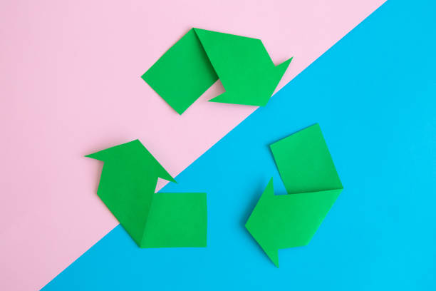 istock Recycling sign on colorful background. 1140226591