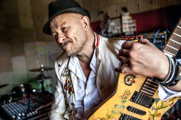 istock Senior Rock Guitarist in Recording Studio 1140231380