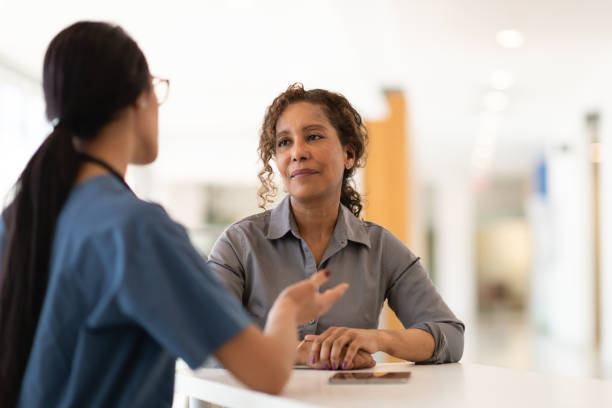 istock Female doctor talking with her senior patient 1140250442