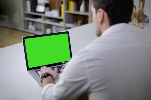 istock Typing on laptop with blank screen. Copywriter man create text and wireless connection to the internet. Horizontal inside shot. 1140251861