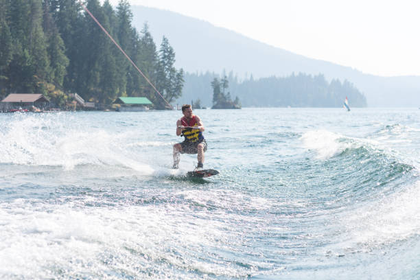 istock Male wakeboarder on lake 1140252176