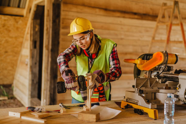 istock Blue-collar woman working on the construction site 1140256946