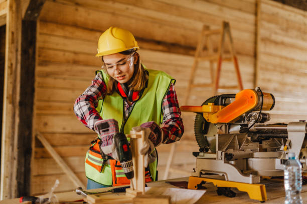 istock Blue-collar woman working on the construction site 1140256971