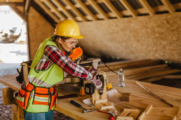 istock Blue-collar woman working on the construction site 1140257041