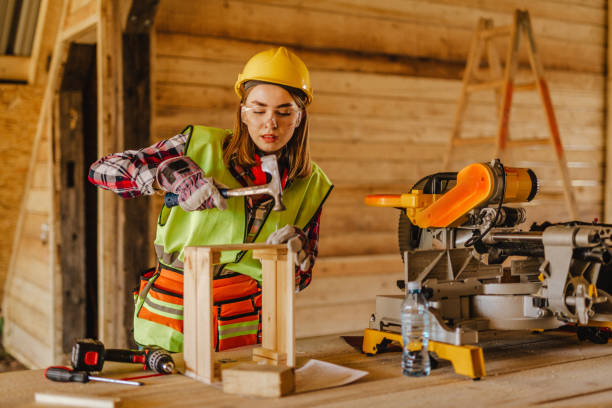istock Blue-collar woman working on the construction site 1140257686
