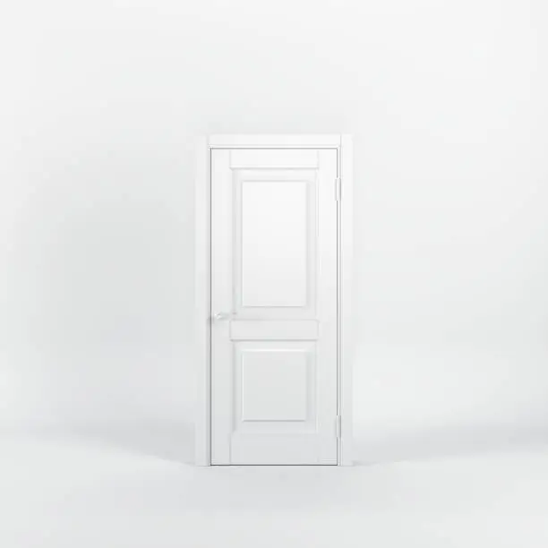 Photo of Outstanding closed white door on white background. All white minimal concept.