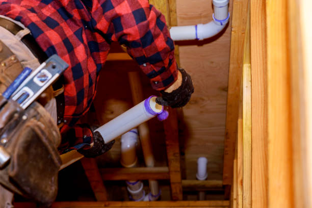 istock Plumber glue white pipe, a mount new plastic drain 1140262553