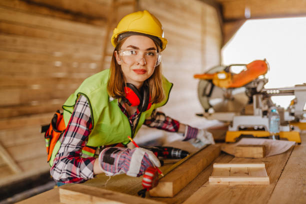 istock Blue-collar woman working on the construction site 1140263976