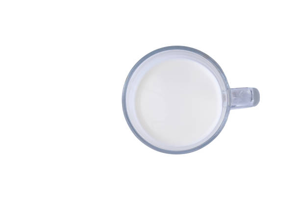 istock a cup of milk on flat lay whti white background 1140269287