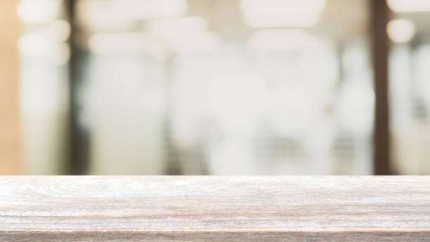 istock Empty wood table top and blurred bokeh restaurant interior background - can used for display or montage your products. 1140269999