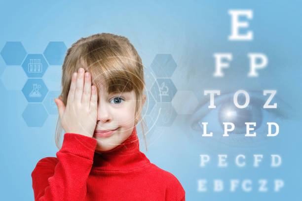 istock A child closing her eye for sight checking. 1140272144