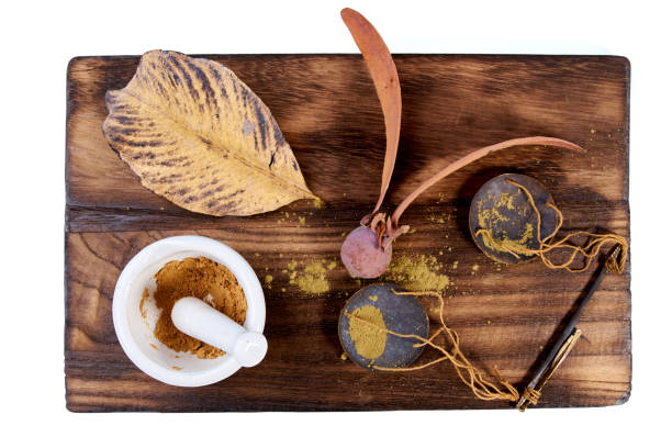istock grinding a medical preparation using Mortar and pestle on Chopping Wood 1140275416