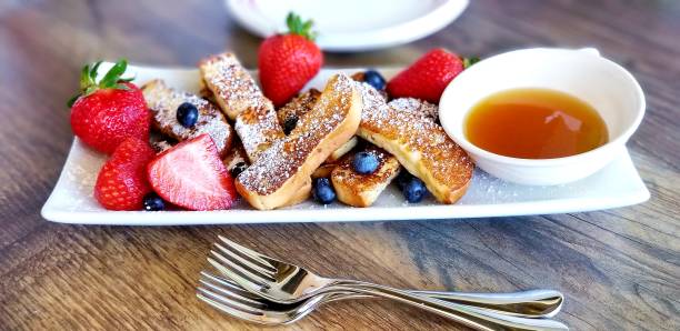 French Toast Sticks French Toast Sticks with fresh fruit french toast stock pictures, royalty-free photos & images