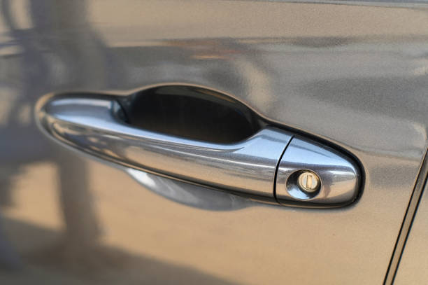 istock Closeup view of car door with handle 1140283326