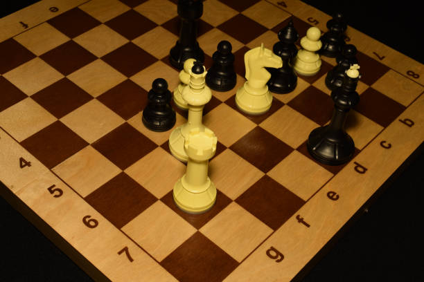 istock Wooden chess board with the chessmen for sport backdrop 1140285271