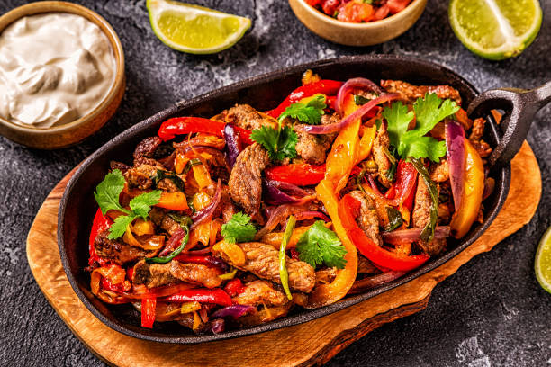 istock FAJITAS with colored pepper and onions 1140286808
