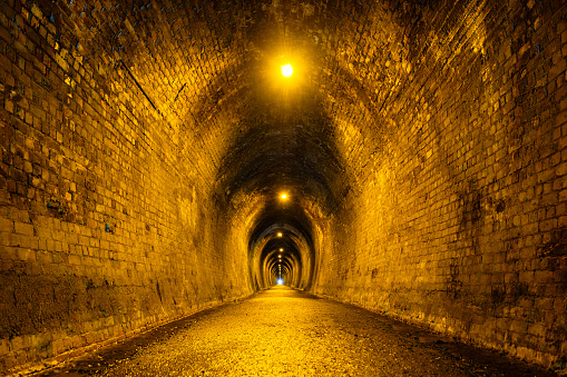 Old brick tunnel. A walkway used to be a railway before.