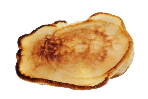 The first ugly fried pancake concept. Isolated on white studio macro food shot
