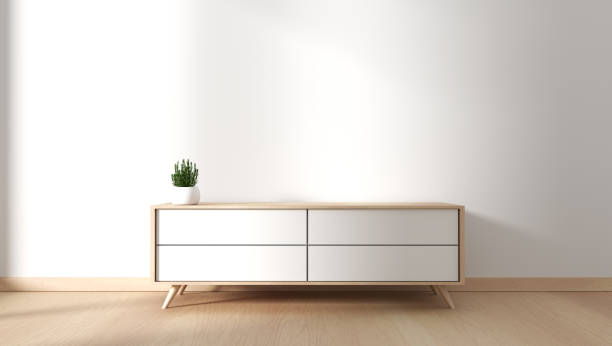 istock Tv cabinet in modern empty room Japanese - zen style,minimal designs. 3D rendering 1140293327
