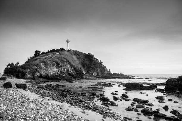istock Old Lighthouse and rocky beach at Laem Tanod Cape Koh Lanta 1140294514