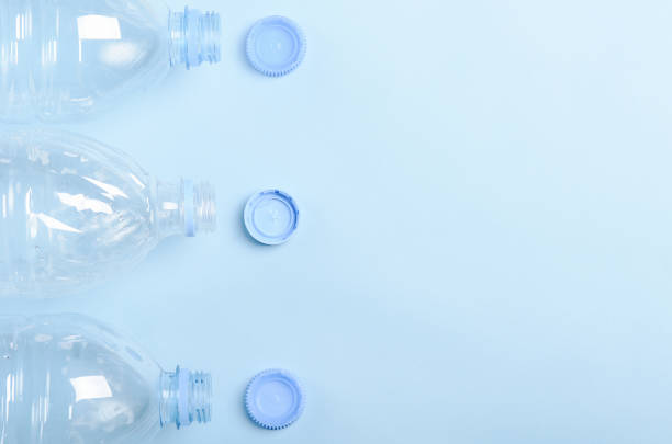istock Plastic bottles on a blue background. Concept plastic dishes, clean water, plastic pollution. Copy space, top view, flat lay 1140294853