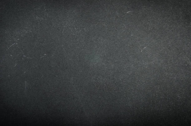 istock Black paper texture with scuffs and scratches. 1140295031