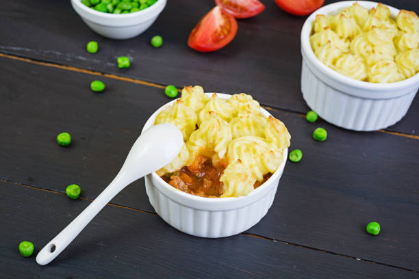 istock Homemade shepherd's pie on wooden background 1140298027