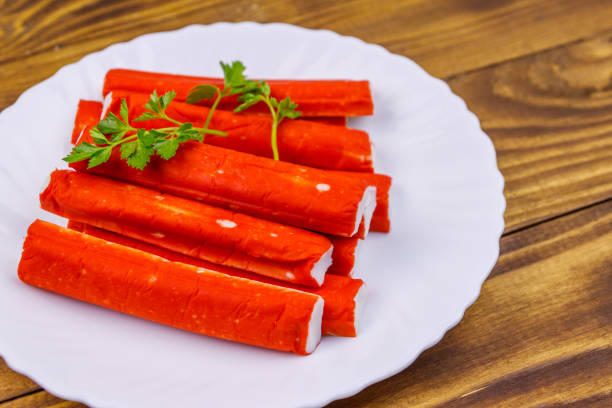istock Crab sticks on wooden table 1140299789