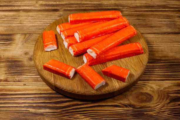 istock Crab sticks on cutting board on wooden table 1140299793