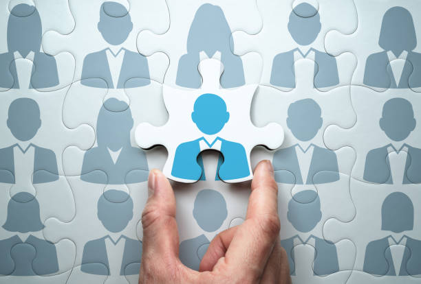 Selecting person and building team. Business people relationship concept. Connecting last jigsaw puzzle piece. new hire photos stock pictures, royalty-free photos & images