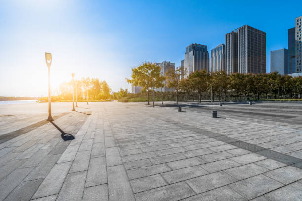 istock Empty pavement front of modern office buildings 1140301346