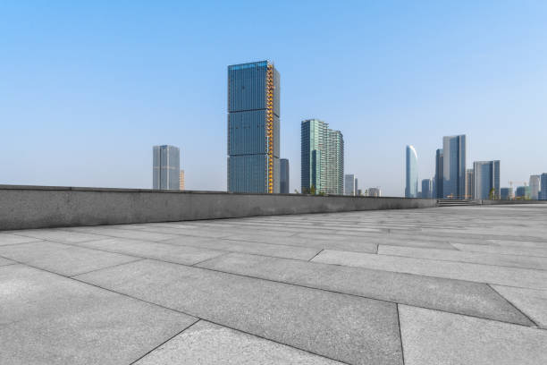 istock Empty pavement front of modern office buildings 1140301415