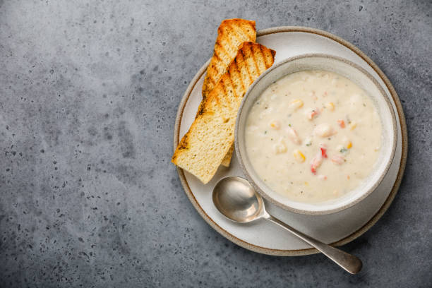 istock Chowder Crab Soup with shrimps and corn on concrete background copy space 1140301497