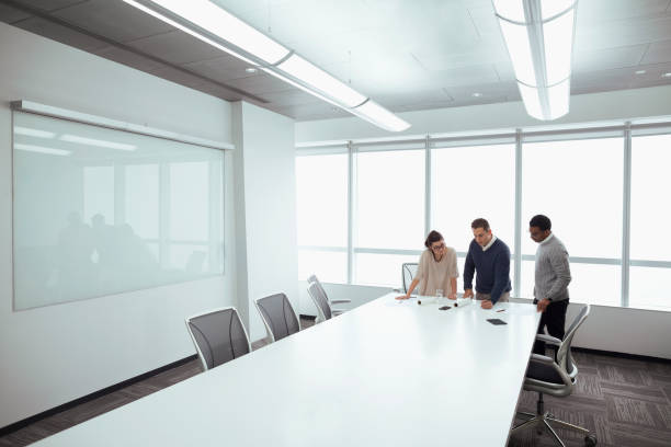 istock Designers working on layouts in conference room 1140307370