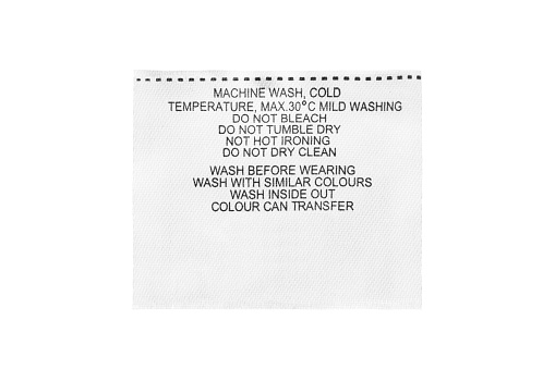 Textile care clothes label on white background