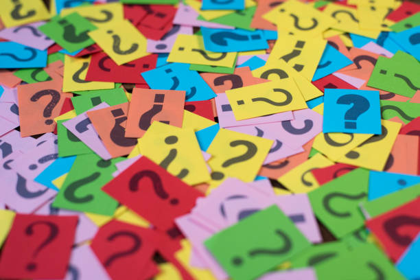 istock Full Frame Shot Of Question Marks On Colorful Adhesive Notes At Table 1140307859