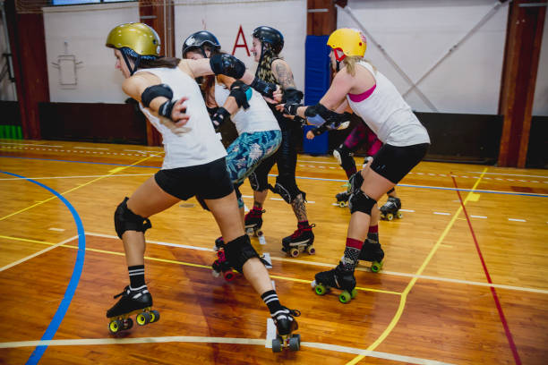 Roller derby girls Roller derby girls training. roller rink stock pictures, royalty-free photos & images